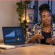 African creator recording a video beside analytics showing audience views and earnings, illustrating Facebook monetization in Africa.